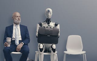 Business man and robot waiting for job interview next to each other - Beyond the hype: Realistic, ethical, and inclusive AI — reflections from UCX blog