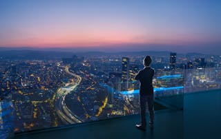 Cisco Prime Collaboration replacement - Businessman overlooking city landscape