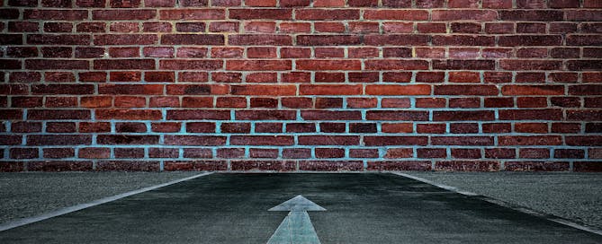 Cisco Prime Collaboration replacement - Cisco Hosted Collaboration Solution reaches end of life - image of hitting a dead end, brick wall