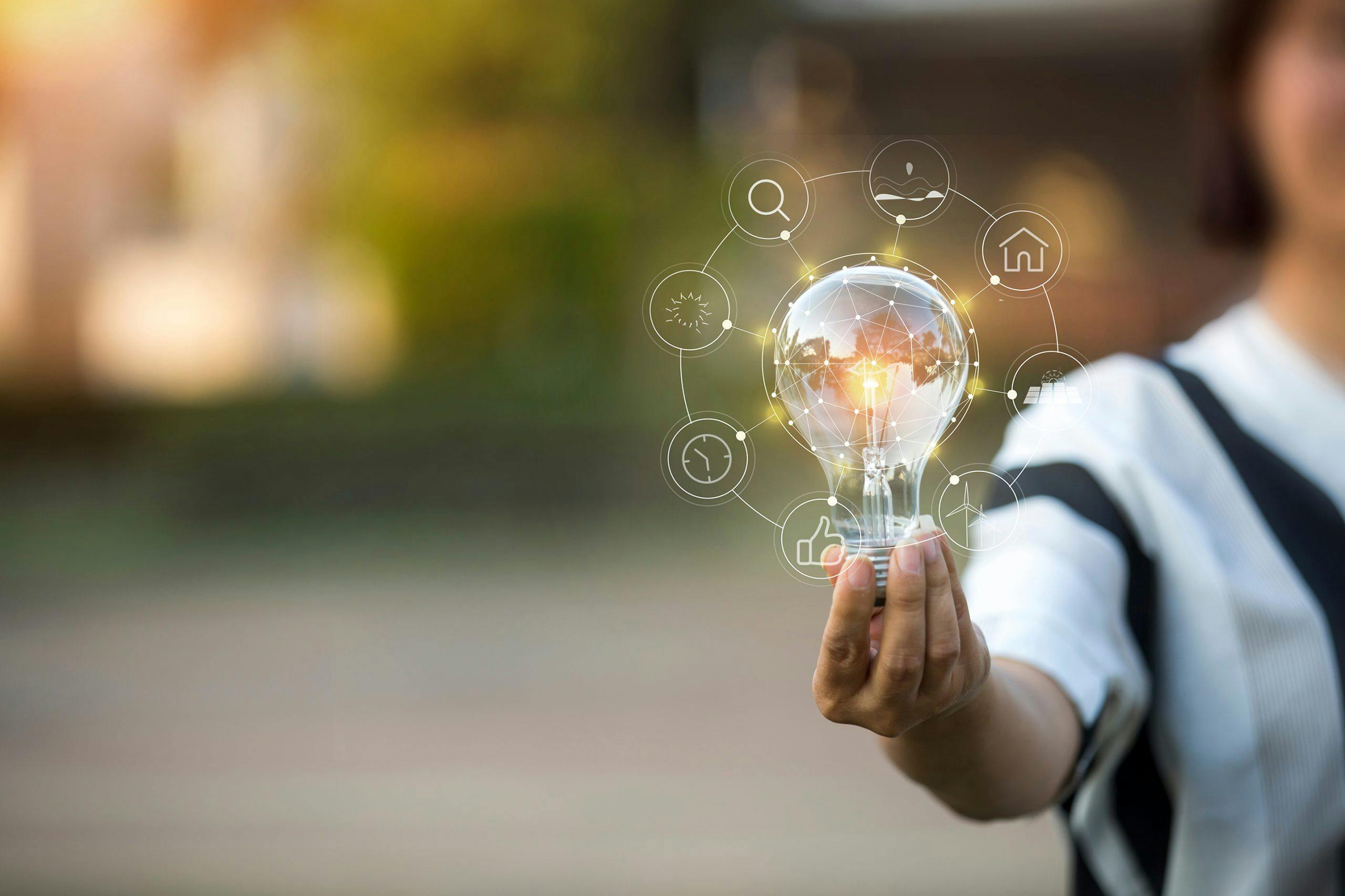 VOSS innovations update video and podcast - image of girl holding lightbulb