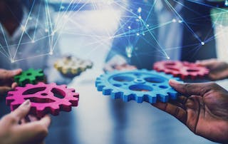 cogs in hands - seamless integration