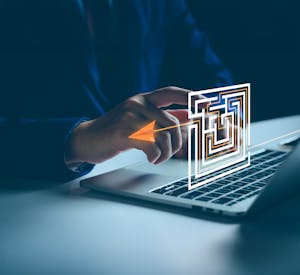 Image showing a person on laptop with a virtual maze and arrow showing exit