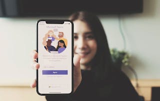 Girl working from home on Microsoft Teams call on her phone - Creating a Successful Microsoft Teams Phone Solution for a Global Manufacturing Customer with VOSS