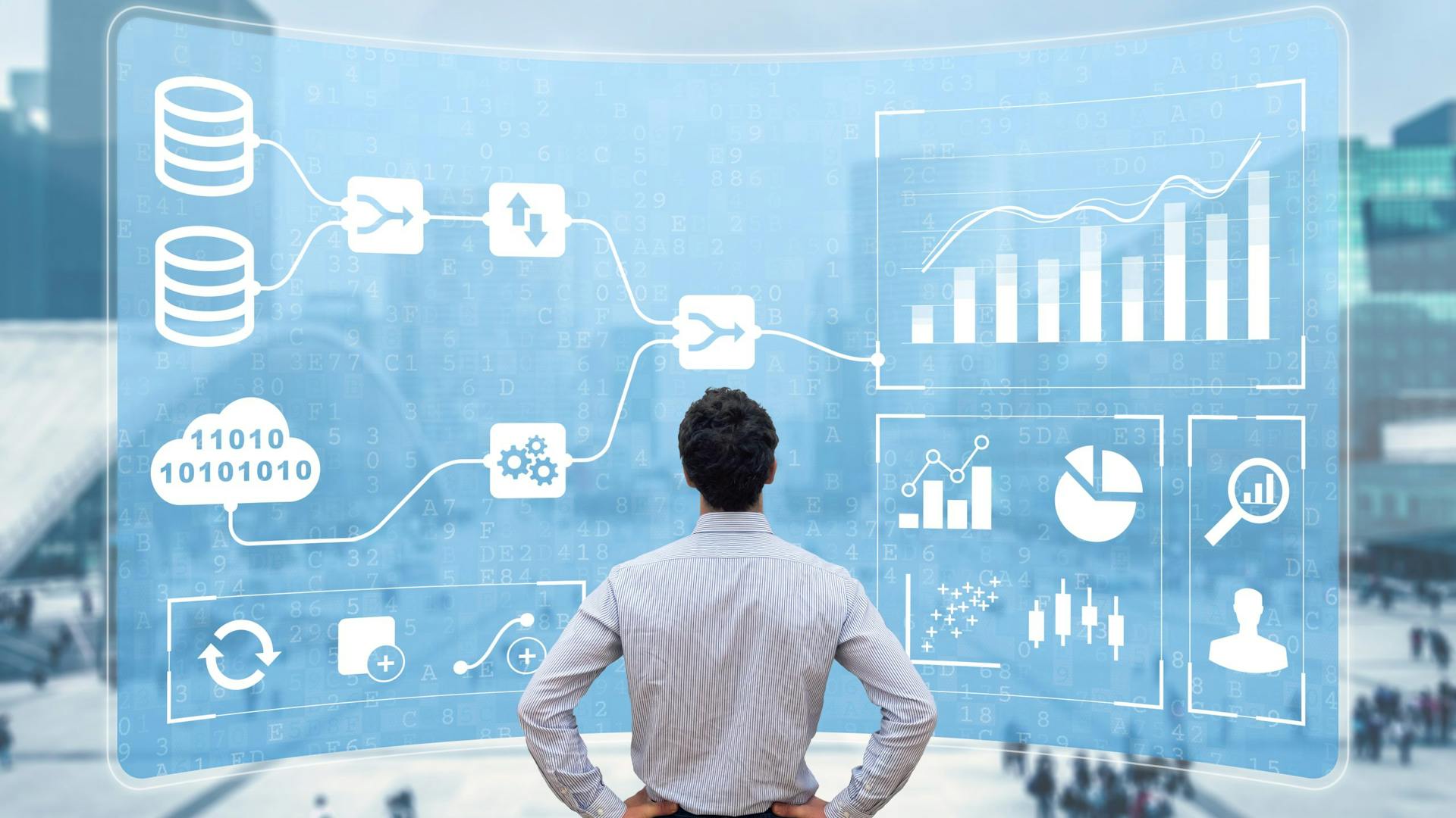 Image of man in front of statistics for Business drivers for UC automation and performance management blog