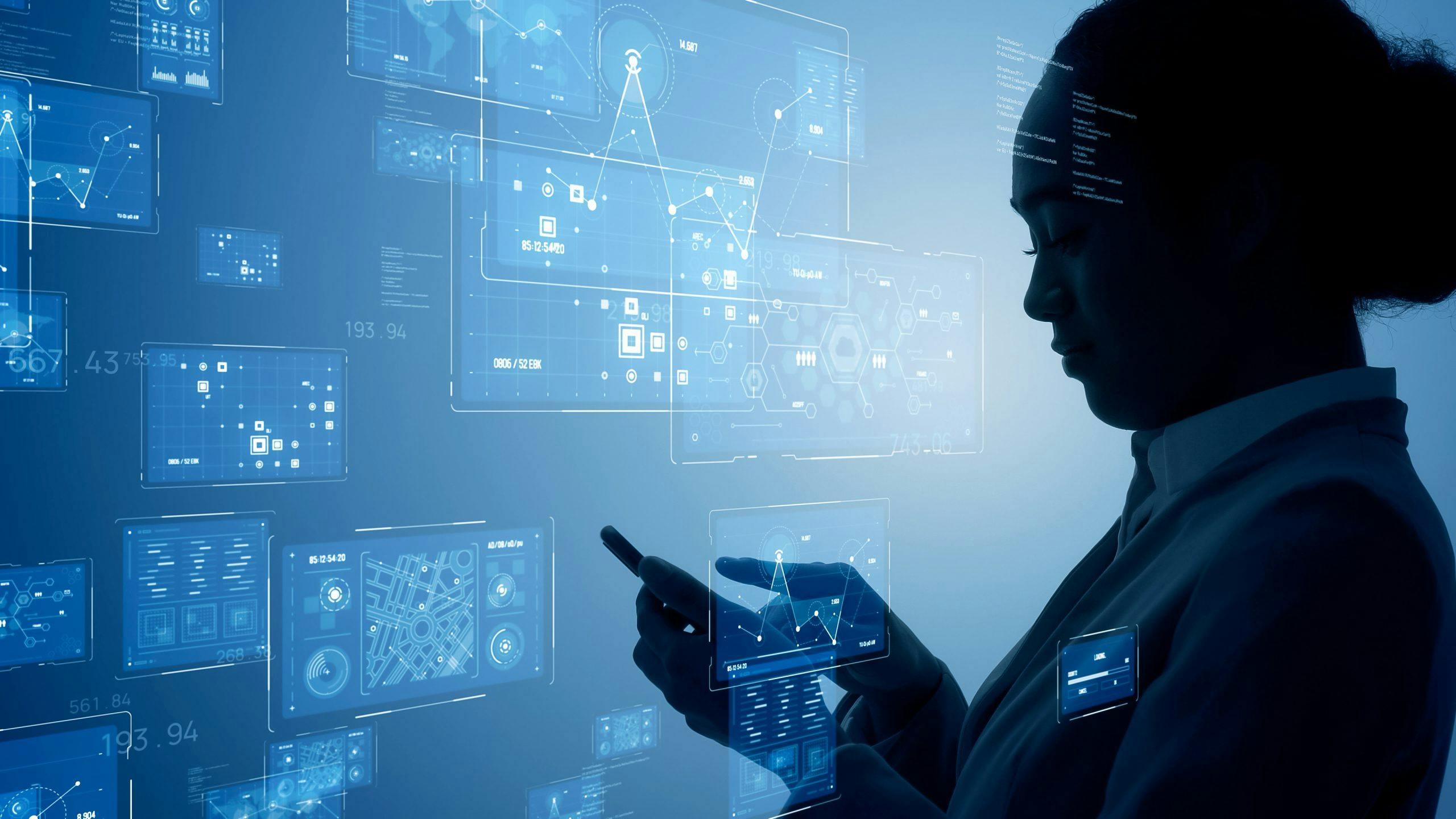 Business woman using mobile phone and all the apps showing virtually