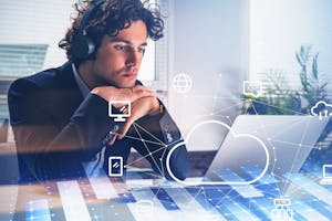 Businessman wearing formal suit is having video conference call via laptop and headphones. Office workplace in the background. Digital interface with cloud data storage. Concept of unified communication.