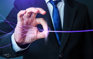 Man in suit represents VOSS streamlining UC automation and processes easily
