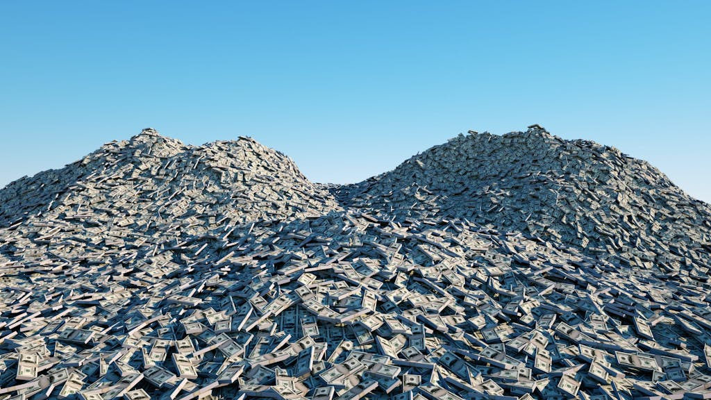 Manage UC expenditure, costs - Image of a mountain of a million dollars