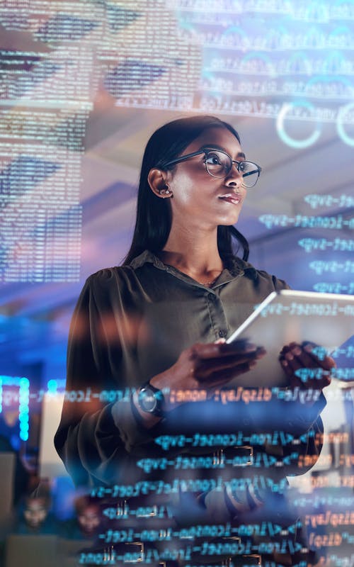 Woman looking at data - Smarter monitoring, fewer headaches: A 30% drop in UC trouble tickets blog