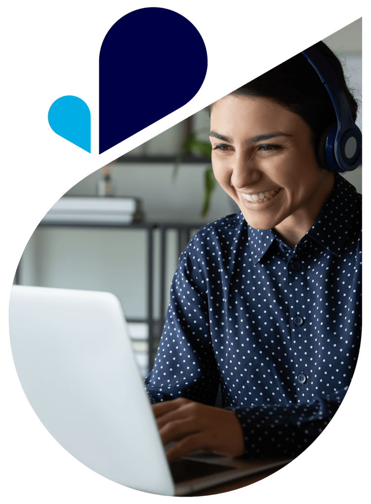 Happy office worker with headset on laptop