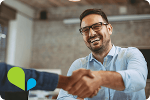 VOSS technology partners - image of happy business man shaking hands
